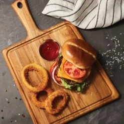 Tramontina 15.75 In X 10.5 In Teak Wood Rectangle Cutting Board With Handle & Groove 6 Tramontina 15.75 In X 10.5 In Teak Wood Rectangle Cutting Board With Handle & Groove -Kitchenware Store 81000023IXM002G